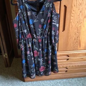 Flower dress with burgundy and blue flowers background is black